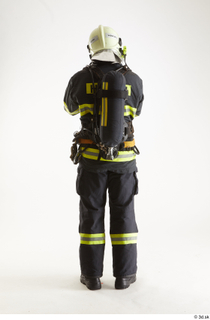 Sam Atkins Fire Fighter with Helmet standing whole body 0005.jpg